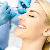 Woman+getting+Botox+at+About+Faces+Cosmetic+Surgery+and+Med+Spa