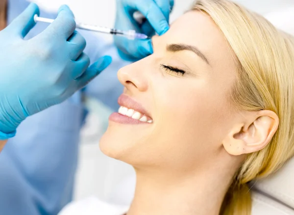 Woman+getting+Botox+at+About+Faces+Cosmetic+Surgery+and+Med+Spa