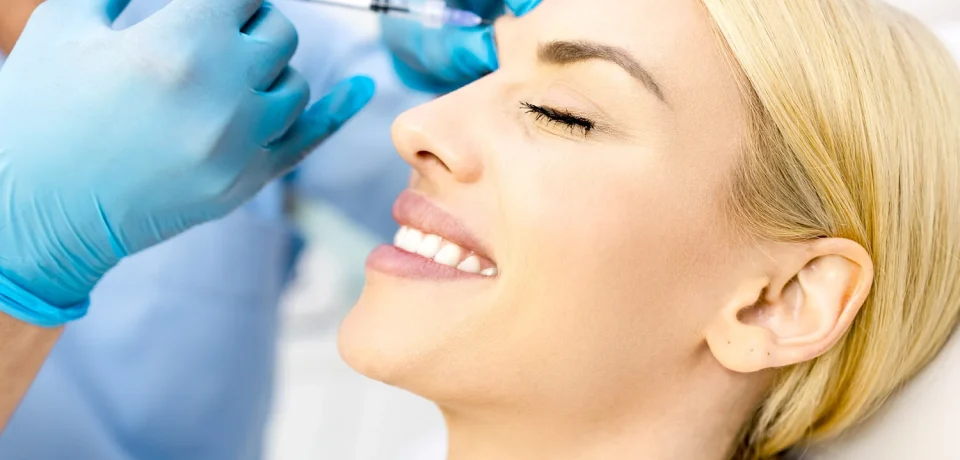 Woman+getting+Botox+at+About+Faces+Cosmetic+Surgery+and+Med+Spa