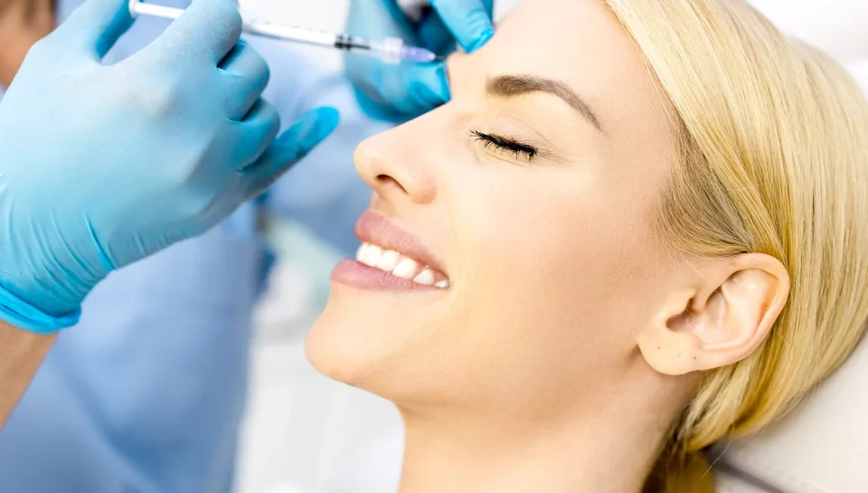 Woman+getting+Botox+at+About+Faces+Cosmetic+Surgery+and+Med+Spa
